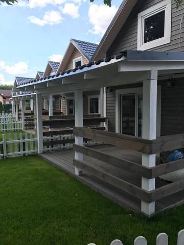 Фото номера Вилла с видом на сад Лоджи Woodhouse Resort г. Dobrogoszcz 11