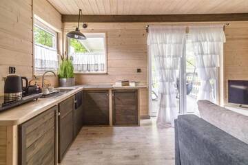 Фото номера Вилла с видом на сад Лоджи Woodhouse Resort г. Dobrogoszcz 12