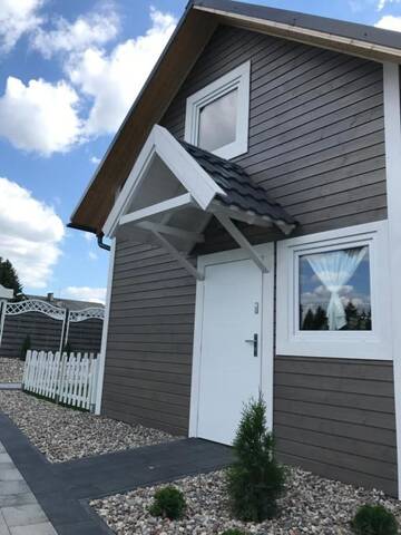 Фото номера Вилла с видом на сад Лоджи Woodhouse Resort г. Dobrogoszcz 13